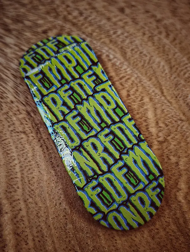 Redemption Pebblewood Fingerboard Deck with Unique Wood-Grain Pattern